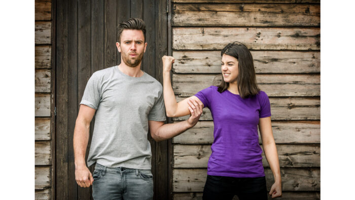 Couple showing strength - lifestyle photography by Colin Hawkins