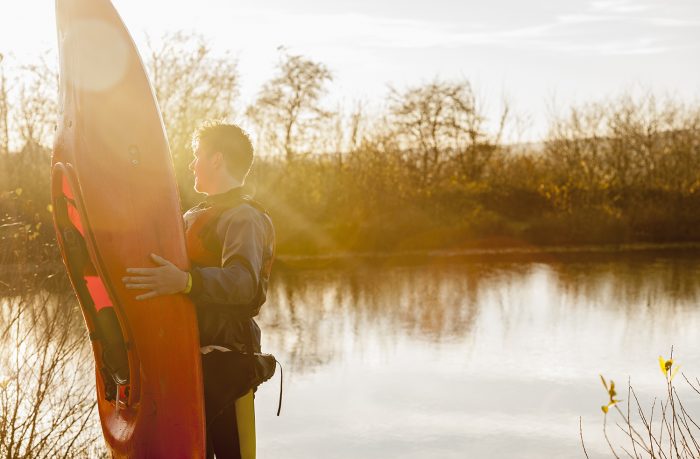 Preparing to kayak at dawn location photography by Colin Hawkins