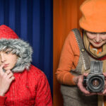 Advertising portrait photography of two women of different ages by Colin Hawkins. Left image is a young woman in a pensive mood with finger in mouth with red coat against blue background. Right image is a senior woman wearing orange clothes against an orange background taking a photograph with an old Hasselblad camera.