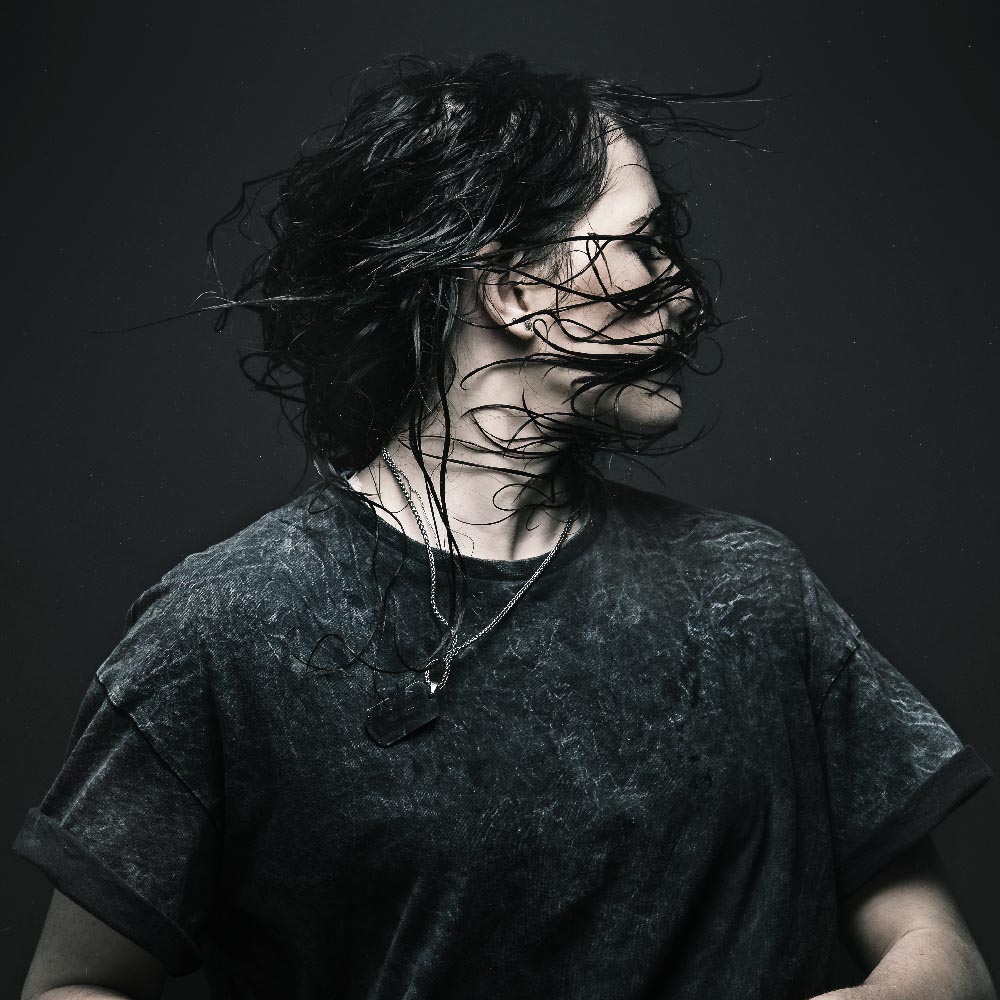 Music press portrait for Bon Hodgson of wet hair
