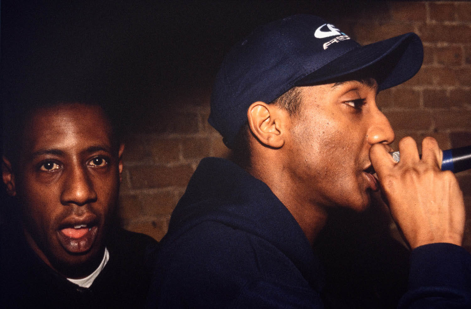 Early 1990s drum and bass club night with Mc on mic captured by photographer Colin Hawkins